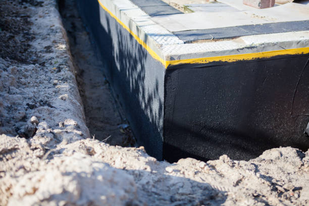 Professional Waterproofing technician working in Belmont, WI